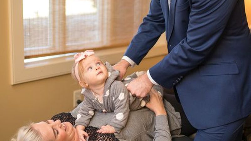 Dr. Brandon Meye adjusting a young patient at Lake Country Health Center